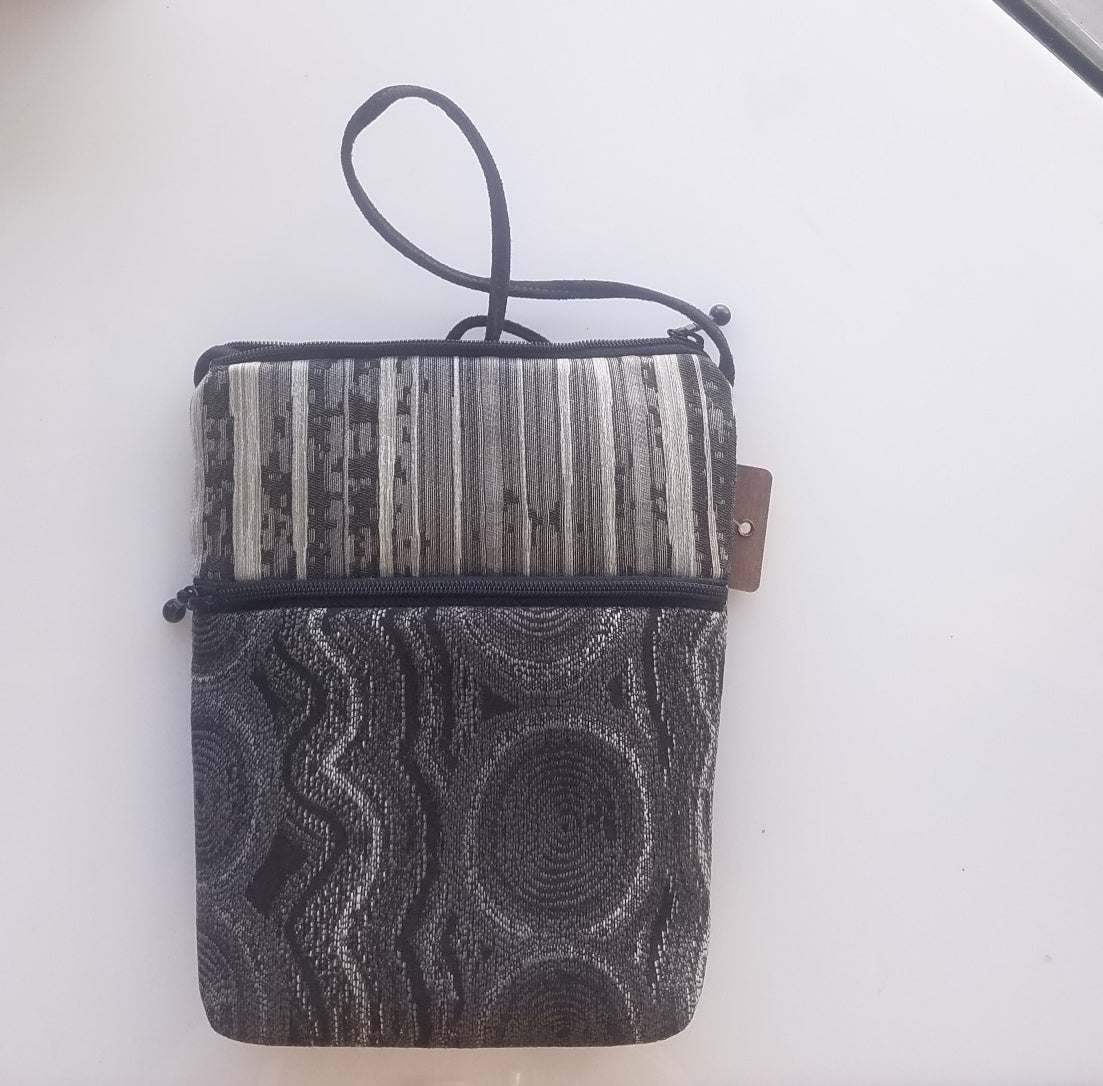 Vegan cross body hand bag in black and grey