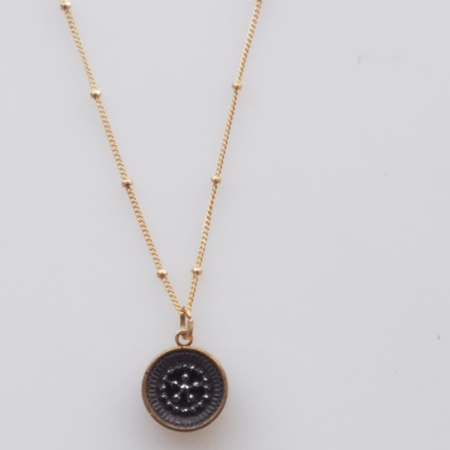 Victorian button on chain