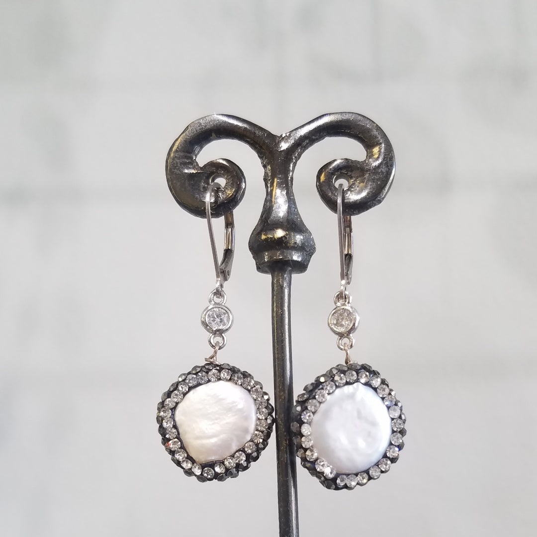 Round pearls surrounded with sparkle earrings