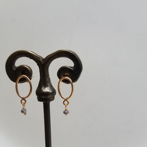 Golden pair of posts/hoops earrings