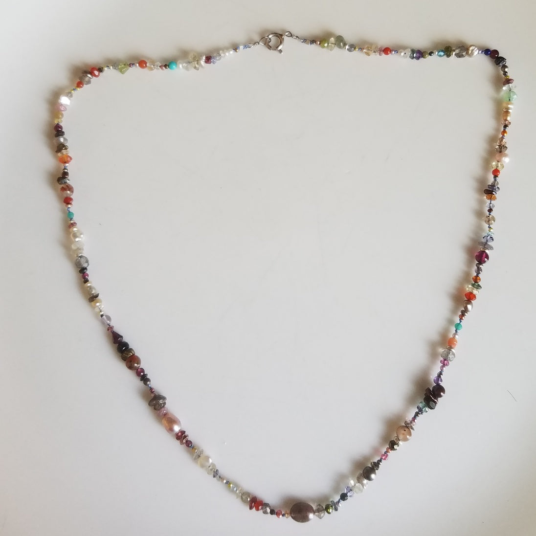 Pearls and gems necklace