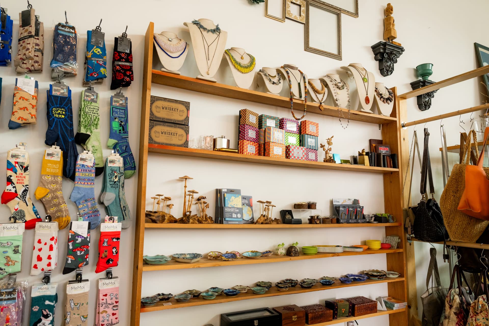 Socks, jewelry, and curated goods on display at Antiqua