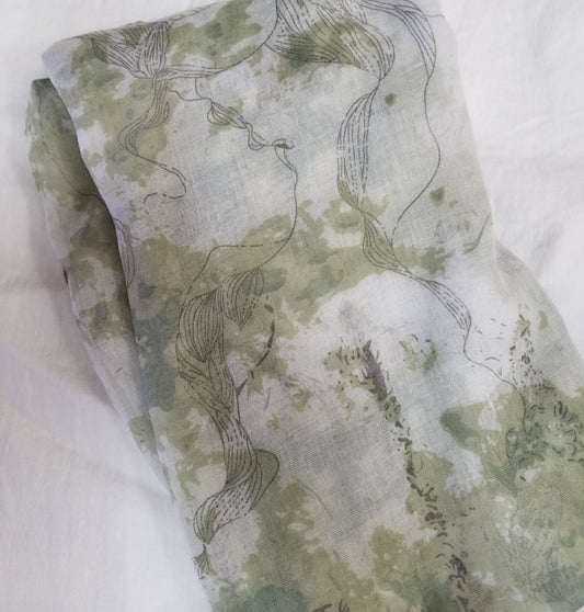 Green scarf with sketching
