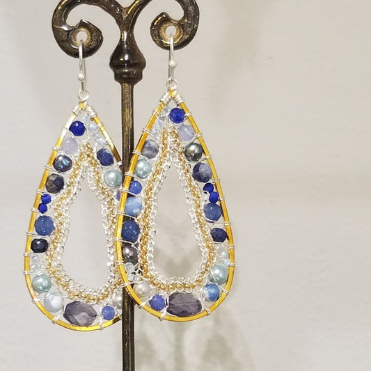 All blues farmed in gold earrings