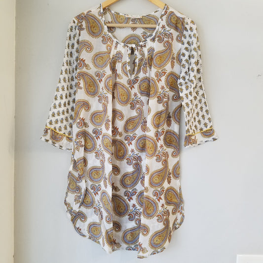 Ochre paisley on white tunic