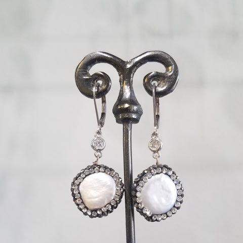 Round pearls surrounded with sparkle earrings