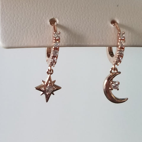 Rose gold hoops earrings with moon and star